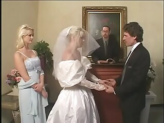 Devious man  deliver his young charming wife Missy Monroe into the filthy hands of couple latex maniacs in breathing gas masks